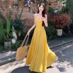 Seaside vacation yellow spaghetti strap dress, new French waist-cinching slimming wide-slung dress, summer long dress for women