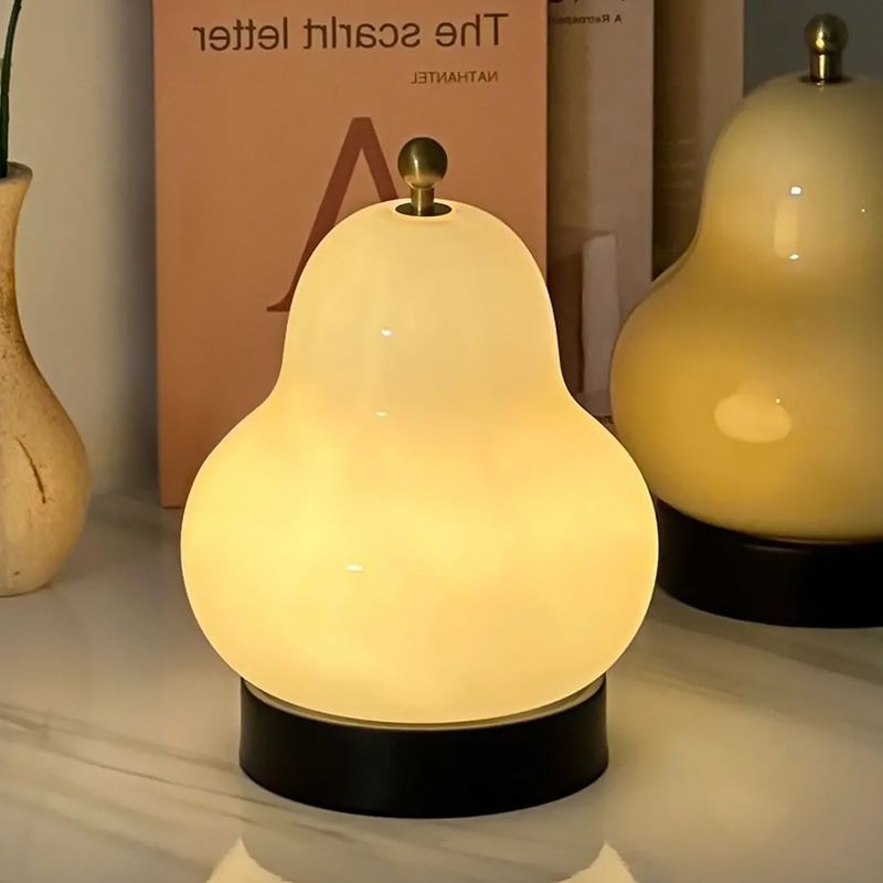 O1CN01VhdtPr29CFreXc1vq_2214890988031-0-cib.jpg Cream pear table lamp Internet celebrity sense of luxury sense of antique bedroom bedside lamp glass charging touch portable night light - Image 1